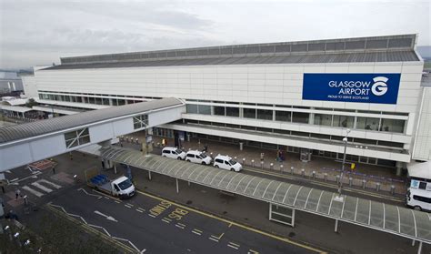 Passengers evacuated from KLM flight at Glasgow Airport as pilot suffers suspected heart attack ...