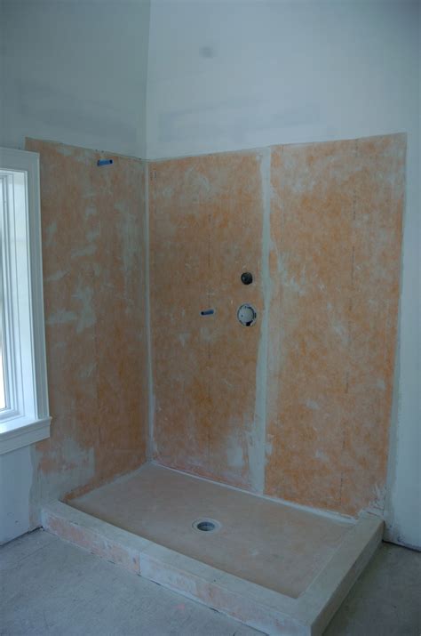 A water-resistant backer board is installed behind the shower tiles. | Building America Solution ...