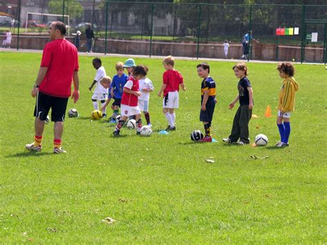 Little Kids on Football Training in the Park Editorial Photography - Image of buildings, balls ...