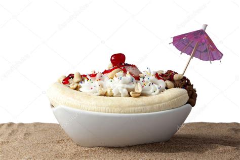 Bowl of banana split in sand — Stock Photo © bakerjim #12195163