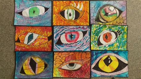 an art project with many different colored eyes