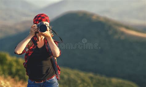 Woman Tourist Photographer with Camera on Top of Mountain at Sun Stock Image - Image of ...