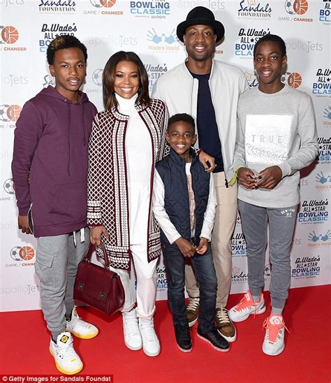 Gabrielle Union at charity bowling bash with Dwyane Wade and kids ...