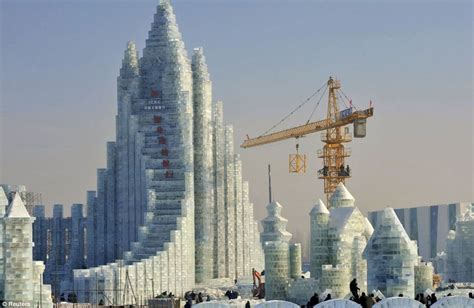 China's giant frozen castle built entirely from ICE: Enormous structure that towers over ...