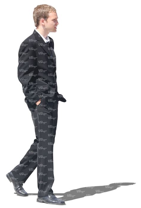 man in a black suit walking - VIShopper