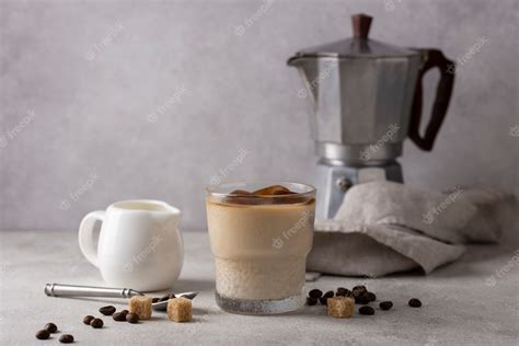 Premium Photo | Delicious coffee cup and sugar cubes