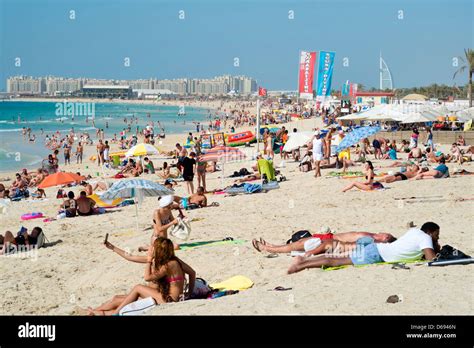 Busy beach near Marina at New Dubai in United Arab Emirates Stock Photo ...