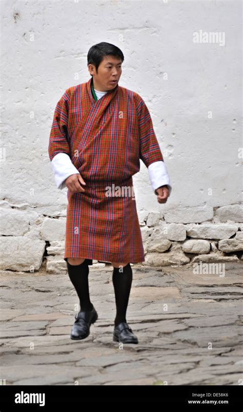 Man wearing traditional outfit called gho, Paro, Bhutan Stock Photo - Alamy