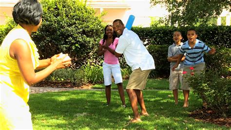 Young Ethnic Family Playing Baseball Outdoors Together In The Park Stock Footage Video 4313435 ...