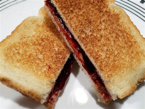 Toasted Peanut Butter and Black Raspberry Jelly Sandwich - Shawn On Food