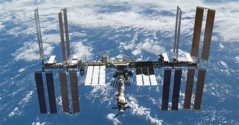 NASA Astronauts Spacewalk to Install Dock at Space Station | Time