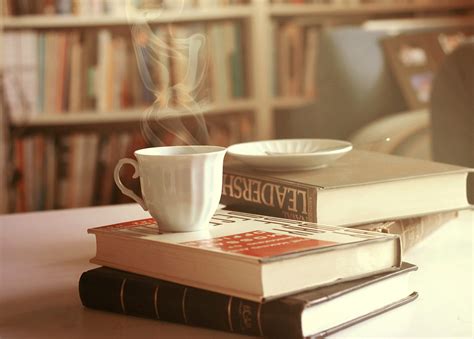 Quotes about coffee: "Pause while reading a book only in case ..." - Comunicaffe International