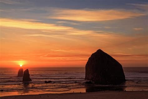 Haystack Rock Ocean Sunset, Cannon Beach, Oregon Photograph by Kay ...