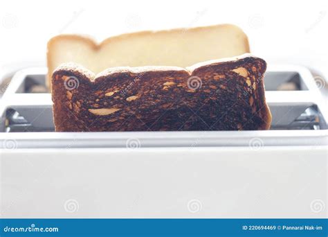 Burnt Toast and Bread Slices in Toaster. Stock Image - Image of careless, cook: 220694469