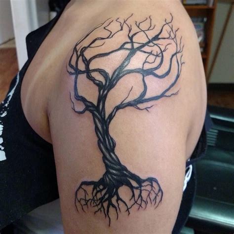 Tree without leaves with long roots shoulder tattoo - Tattooimages.biz