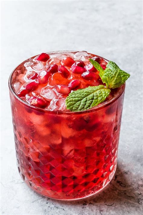 Pomegranate Cocktail with Mint Leaves and Crushed Ice. Stock Photo - Image of glass, beverage ...