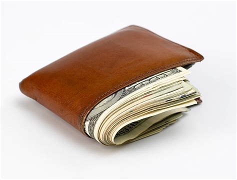 Wallet Full Of Money Stock Photos, Pictures & Royalty-Free Images - iStock