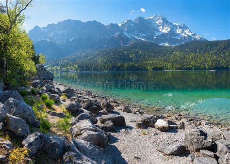 Rocky Bathing Beach at Lake Shore Eibsee, View To Zugspitze Mountain ...