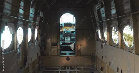 Close-up view inside cockpit of Soviet fighter aircraft of World War II fighter at abandoned ...