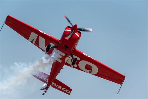 A Red Plane in the Blue Sky · Free Stock Photo