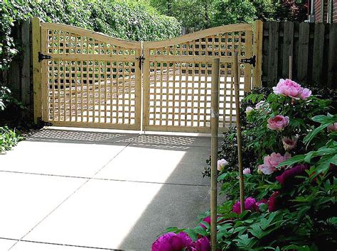 Wood Scalloped Square Lattice Double Gate by Elyria Fence