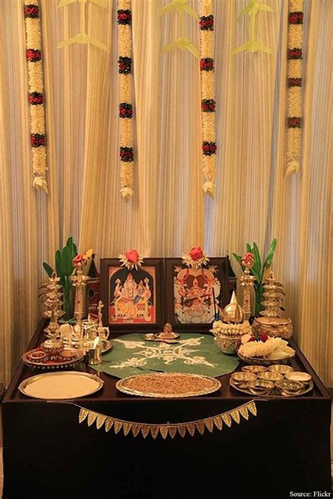 The broad wooden platform/table adorned with all the necessary ingredient or Diwali Puja. The ...