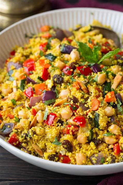 A flavorful, hearty Moroccan inspired, veggie packed couscous side dish that's perfect for ...