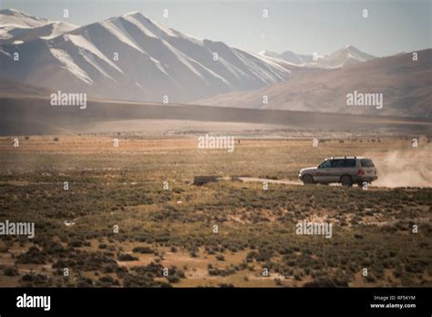 mountain road with sunset background Stock Photo - Alamy