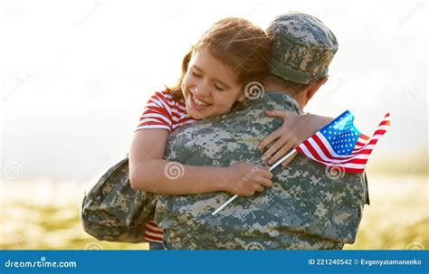 Happy Girl Daughter with American Flag Hugging Father Came Back from US ...