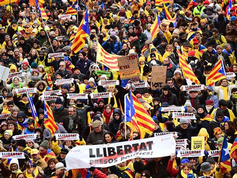 Inside Catalonia's pro-independence movement: 'They beat us with sticks... we have to beat them ...