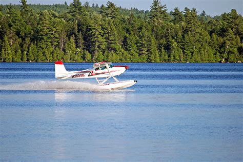 Float Plane Landing on the Lake Photograph by Barbara West - Pixels