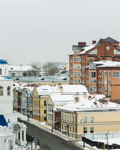 Premium Photo | A small europe town architecture under the snow on a ...