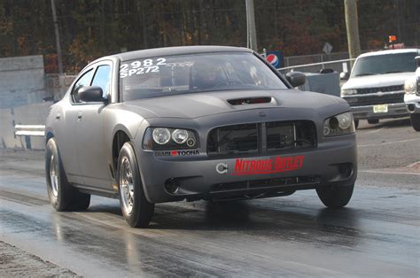 2007 Dodge Charger SRT8 1/4 mile Drag Racing timeslip specs 0-60 - DragTimes.com