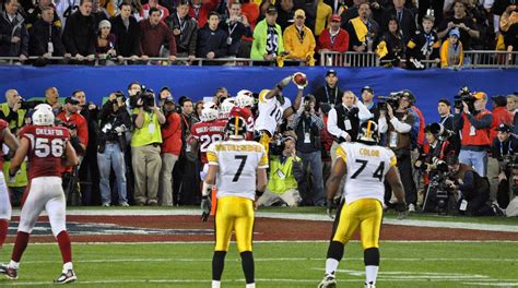 Big Ben and Willie Colon watch as Santonio Holmes makes the game winning catch in Super Bowl ...