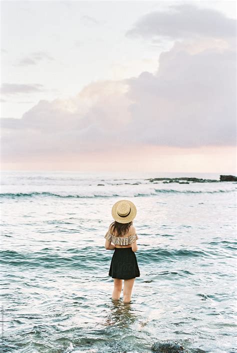 "Young Woman Standing In Ocean Looking Out" by Stocksy Contributor "Daniel Kim Photography ...