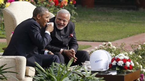 Narendra Modi met with Obama in a suit pin-striped with his own name, over and over