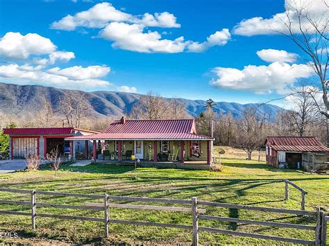 Tennessee Farmhouses for Sale, Tranquil Estate with Pond and Mountains Views - AnyHome Lovers