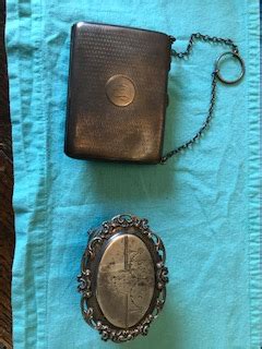 I have two small antique silver items from my Grandmother a small ...