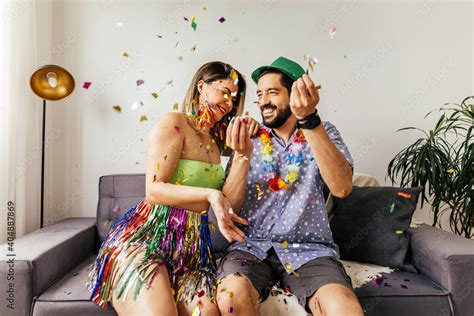 Brazilian Carnival. Couple celebrating carnival at home Stock Photo ...