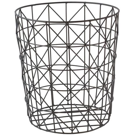 a metal wire basket with geometric designs on the bottom and sides, in black color