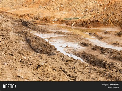 Dirt Road Puddles Mud Image & Photo (Free Trial) | Bigstock