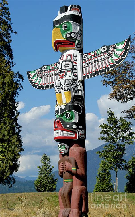 Indian totem pole in Vancouver, Canada Photograph by Gunther Allen - Pixels