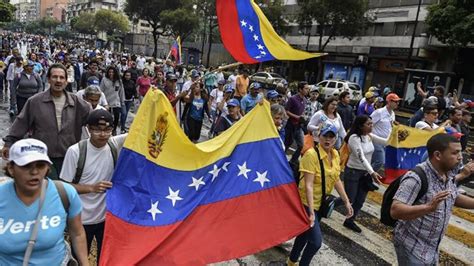 Rival protests held in Venezuela as pressure mounts on Maduro ...