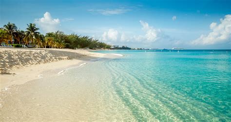 Seven Mile Beach, Grand Cayman, Cayman Islands Photograph By Karol ...