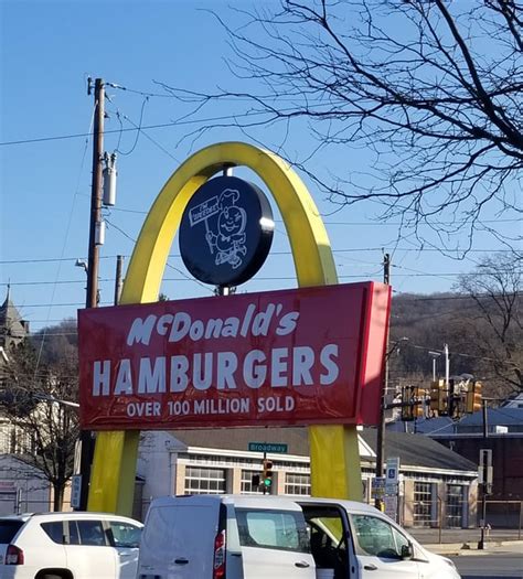 The McDonald's near me still has the single golden arch sign ...