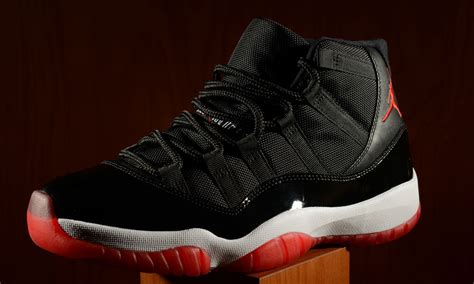 Air Jordan Retro 11 Black/Red Footaction Restock | Sole Collector