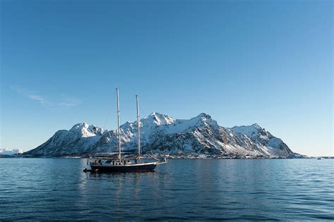 Ship Sailing In Front Of Snow Capped Mountains, Svolvaer, Lofoten ...