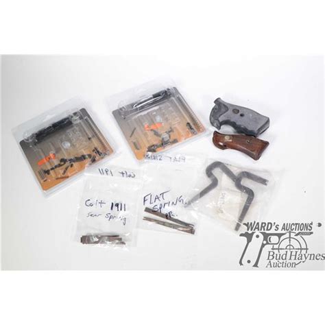 Selection of Colt handgun parts including two new in package GSG 1911 ...