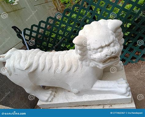 A Statue of a Lion Sitting in the Garden Stock Image - Image of beautiful, background: 277462367