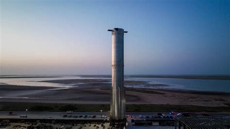 SpaceX rolls Starship Super Heavy booster to launch pad for testing ...